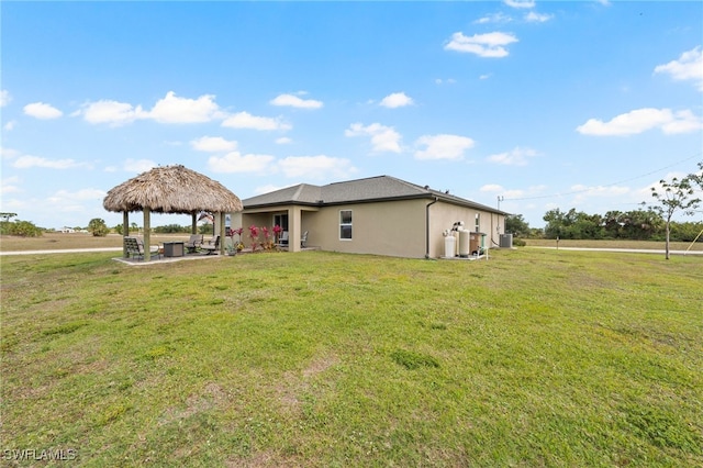 view of yard featuring a gazebo and a patio