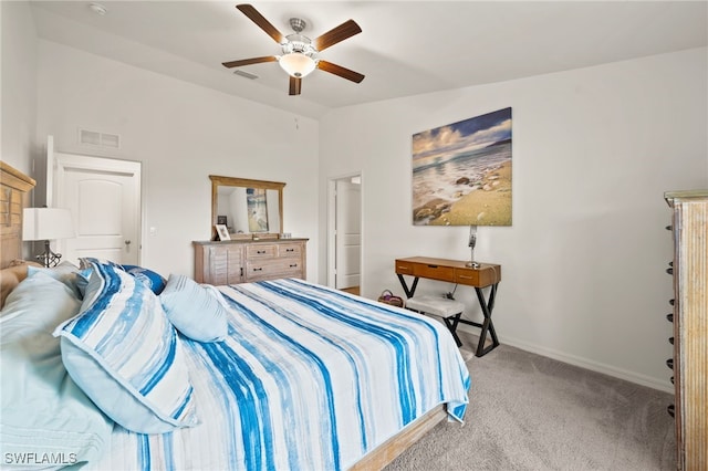 bedroom featuring ceiling fan and light carpet