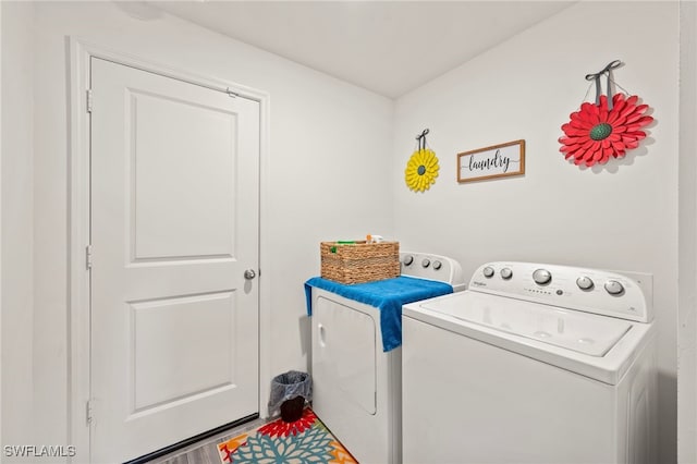 laundry room with washer and clothes dryer