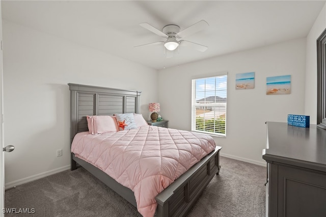 bedroom featuring dark carpet and ceiling fan