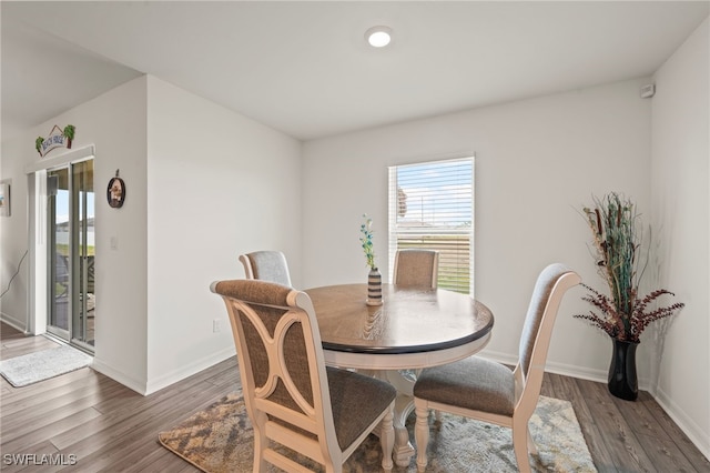 dining room featuring dark hardwood / wood-style floors