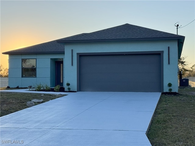 ranch-style home with a garage