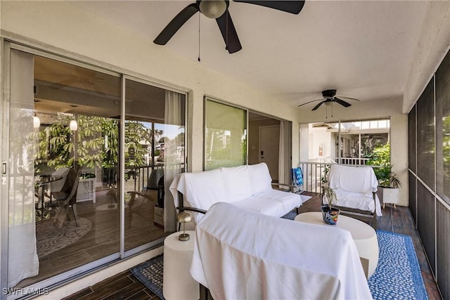 sunroom / solarium with ceiling fan