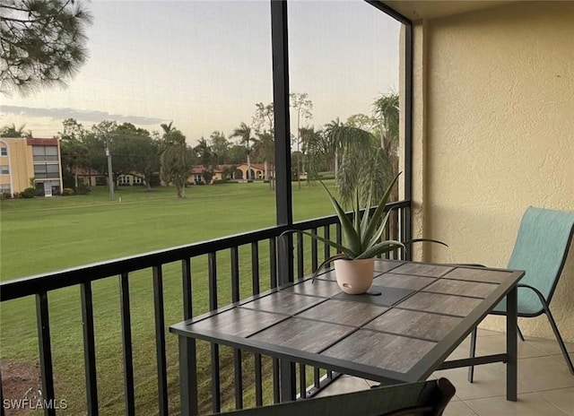 view of balcony at dusk