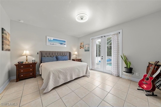 bedroom featuring access to exterior, light tile patterned floors, and french doors