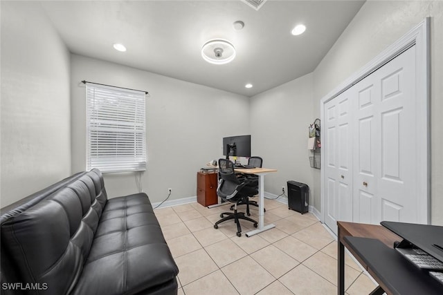 office with light tile patterned floors