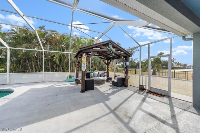 view of patio with a lanai, a gazebo, and an outdoor hangout area