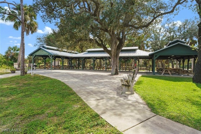 view of home's community with a gazebo and a lawn