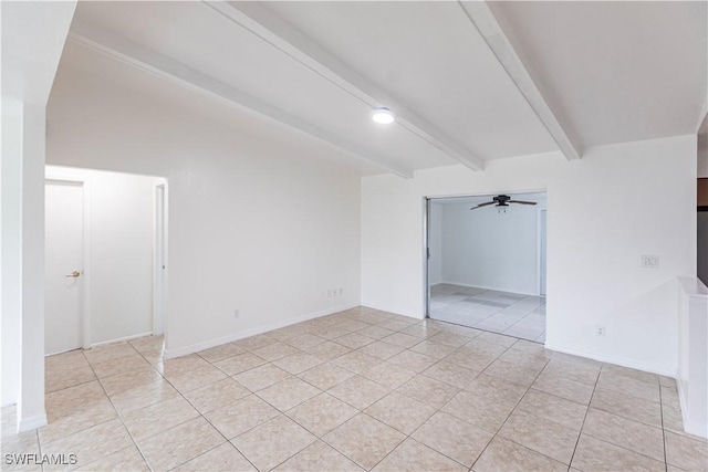 empty room featuring beamed ceiling, light tile patterned floors, and ceiling fan