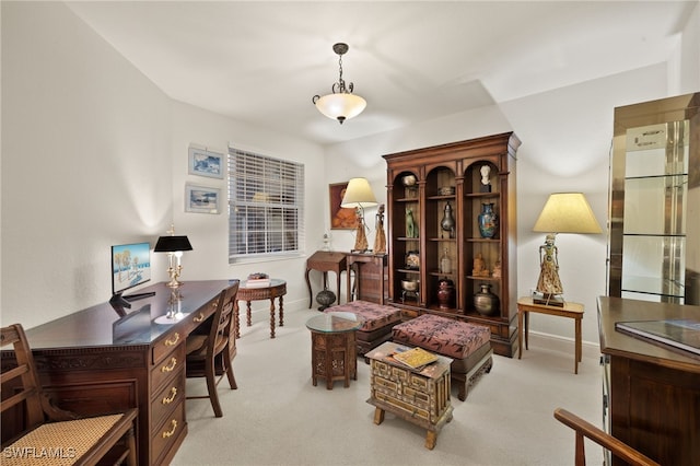 living area with baseboards and carpet flooring