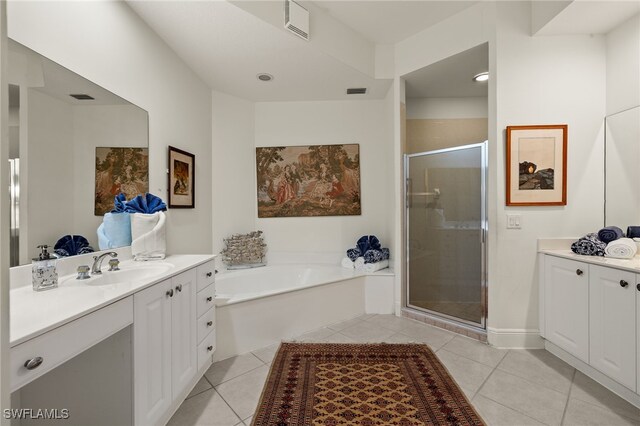 full bathroom featuring a bath, tile patterned flooring, a sink, and a shower stall