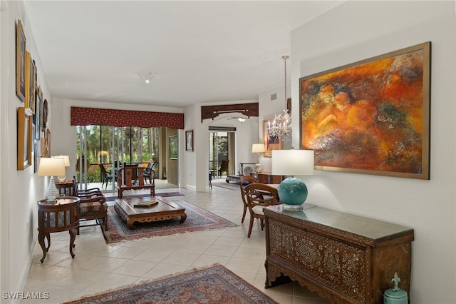 living area with light tile patterned floors, baseboards, and arched walkways