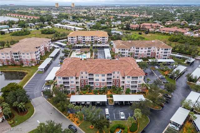 drone / aerial view with a water view