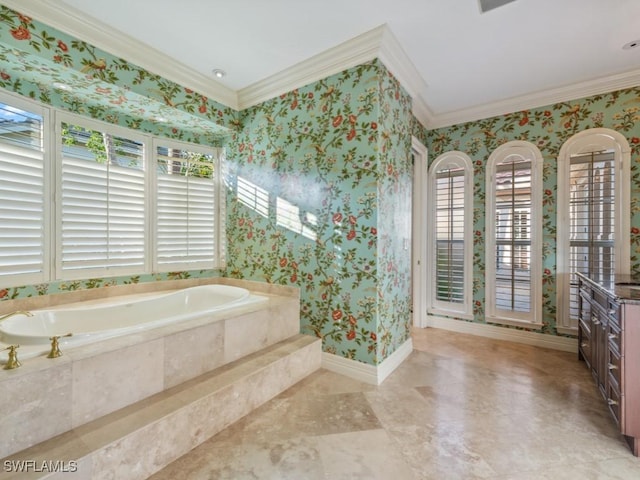 bathroom featuring tiled tub, crown molding, and a wealth of natural light