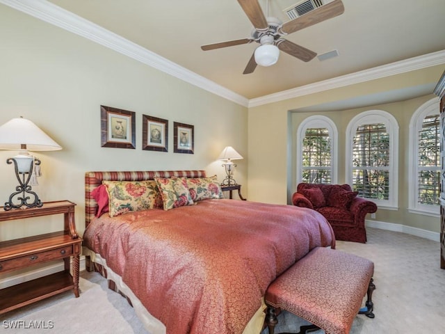 carpeted bedroom featuring multiple windows, ornamental molding, and ceiling fan