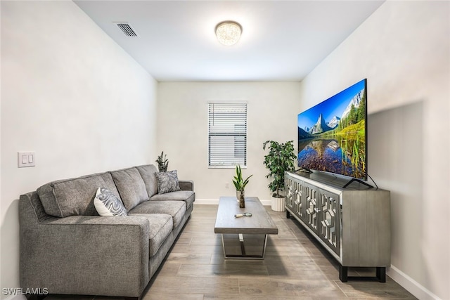 living room with hardwood / wood-style floors