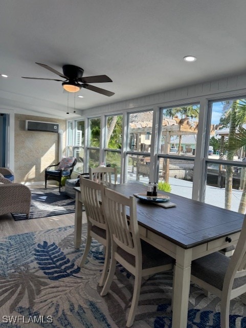 dining space featuring recessed lighting, ceiling fan, and wood finished floors