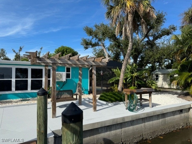 view of swimming pool with a pergola