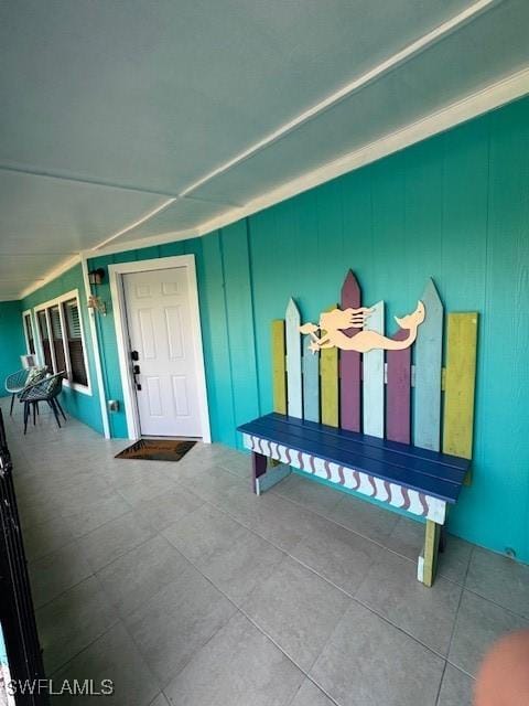 mudroom with tile patterned flooring