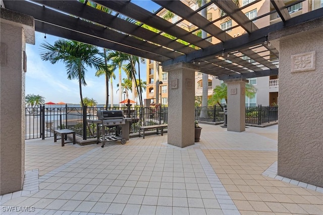 view of patio / terrace featuring grilling area and a pergola