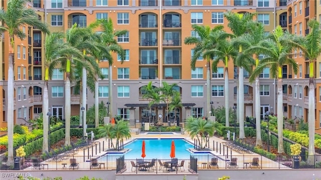 view of swimming pool with a patio area