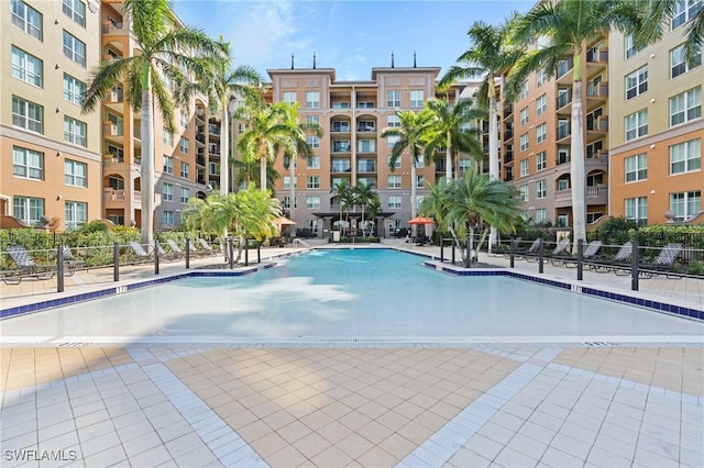 view of swimming pool featuring a patio area