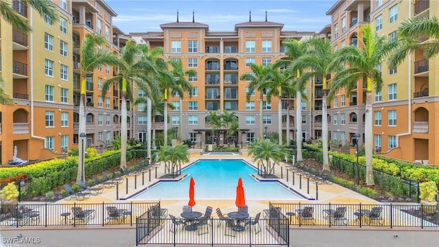 view of swimming pool featuring a patio area