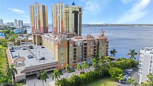 birds eye view of property featuring a water view