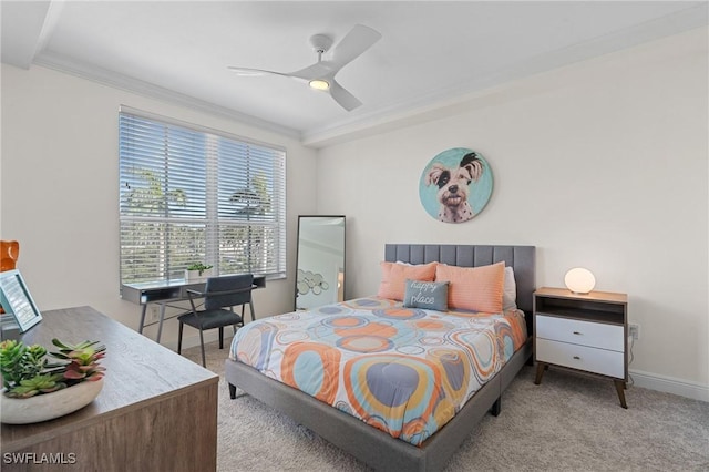 bedroom with light carpet, ornamental molding, and ceiling fan