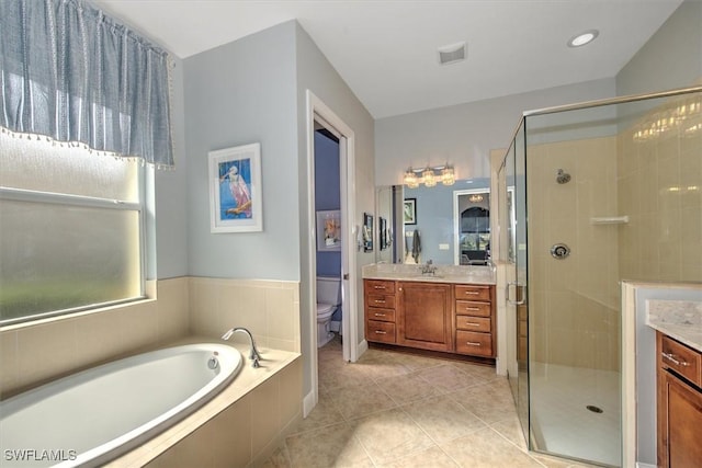 full bathroom featuring a wealth of natural light, toilet, vanity, and shower with separate bathtub