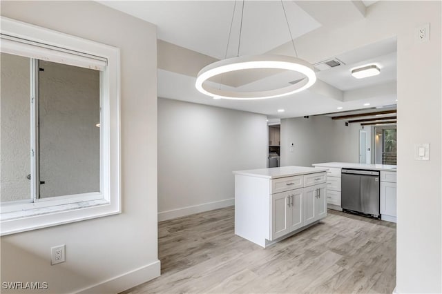 kitchen with pendant lighting, dishwasher, light hardwood / wood-style flooring, and white cabinets