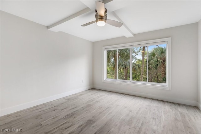 unfurnished room with ceiling fan, a wealth of natural light, and light hardwood / wood-style floors