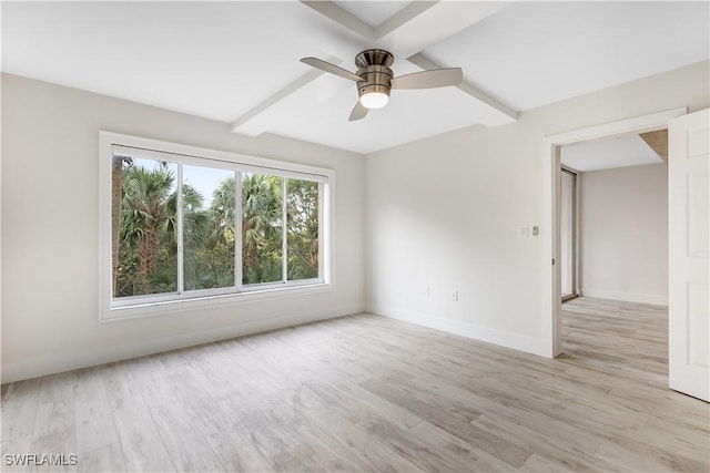 unfurnished room with ceiling fan, beam ceiling, and light hardwood / wood-style floors