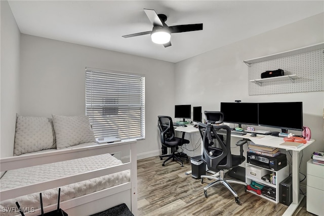 office space featuring ceiling fan and hardwood / wood-style floors