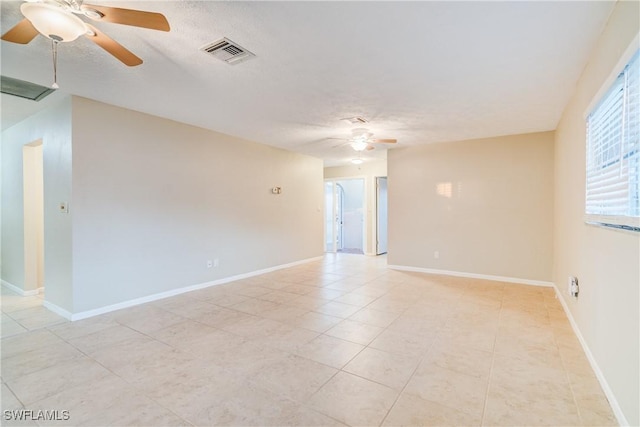 empty room with a textured ceiling