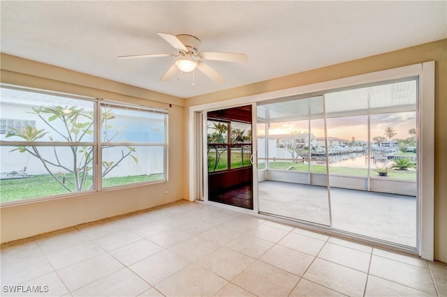 interior space featuring plenty of natural light and ceiling fan