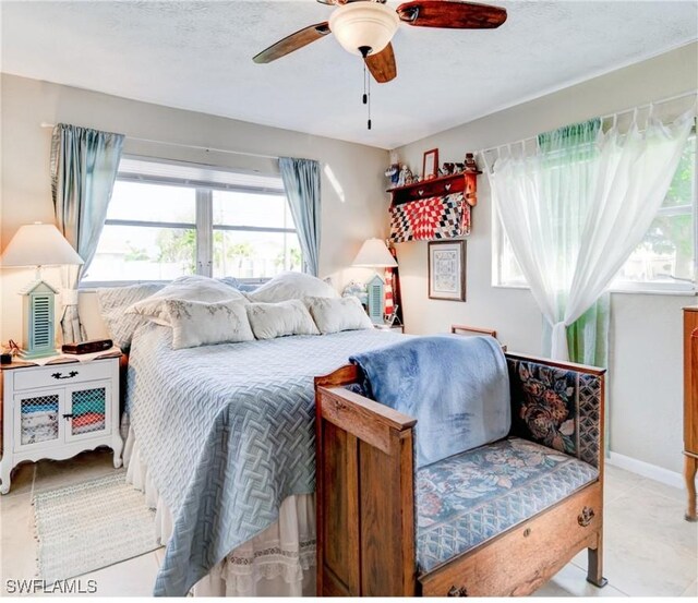 bedroom featuring ceiling fan