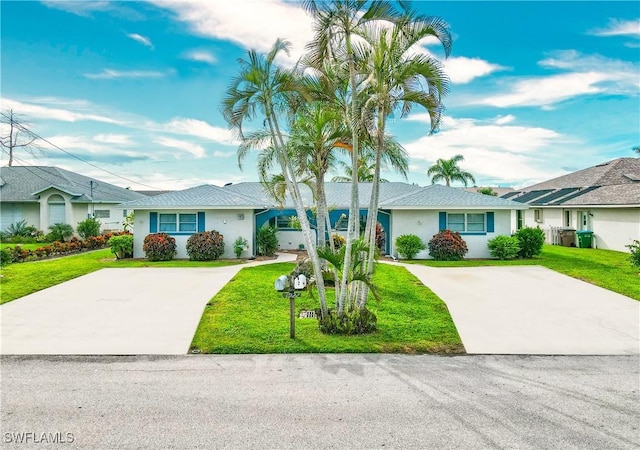 single story home with a front yard