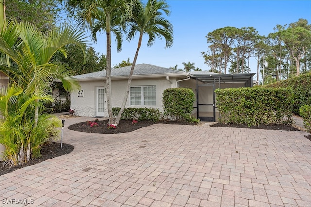 view of front of home featuring stucco siding