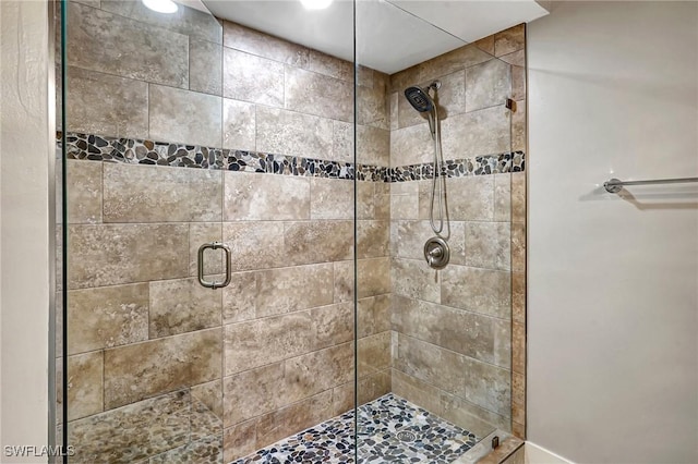 bathroom with an enclosed shower