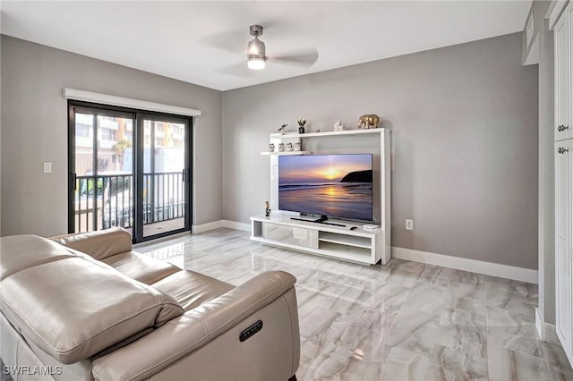 living room featuring ceiling fan