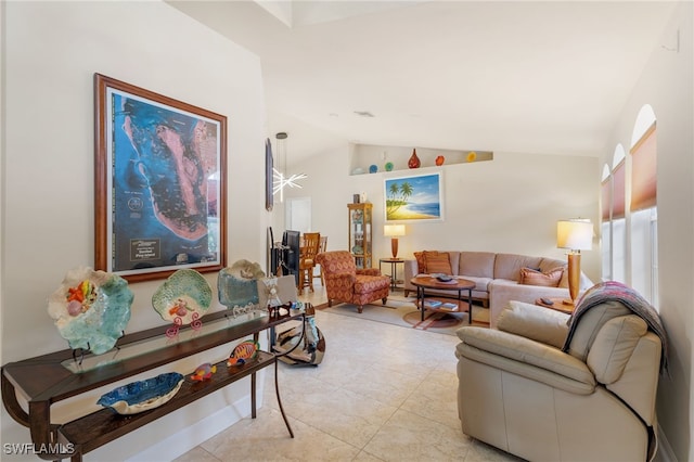 living room with vaulted ceiling and light tile patterned floors