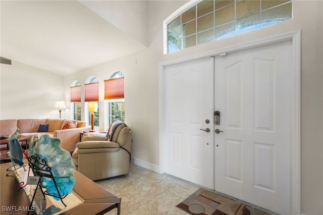 entrance foyer with light tile patterned floors