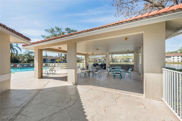 view of patio with a community pool