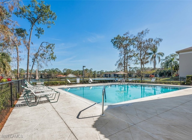 view of swimming pool featuring a patio