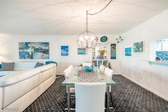 dining space featuring an inviting chandelier, a textured ceiling, and dark carpet