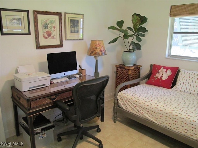 bedroom featuring light tile patterned floors