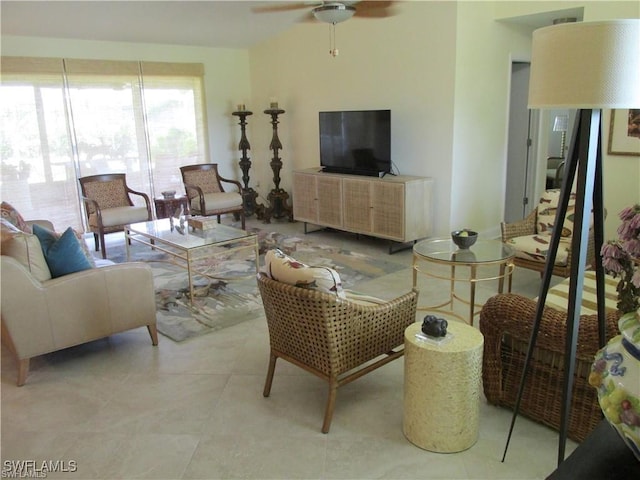 living room featuring light tile patterned floors and ceiling fan