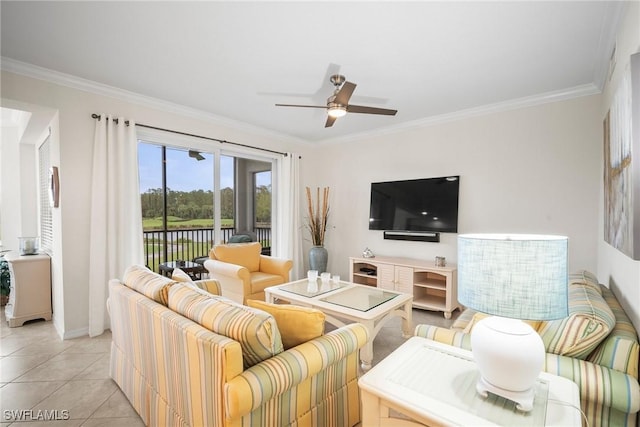 living room featuring crown molding, ceiling fan, and light tile patterned flooring