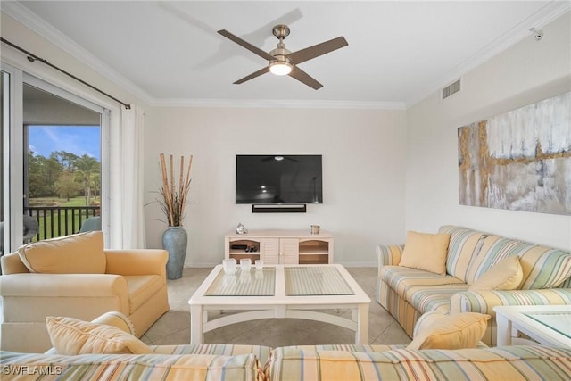 living room featuring ornamental molding and ceiling fan